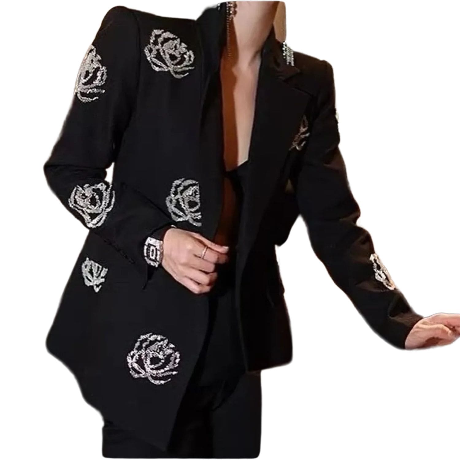 Woman wearing a black blazer decorated with crystal rose embellishments