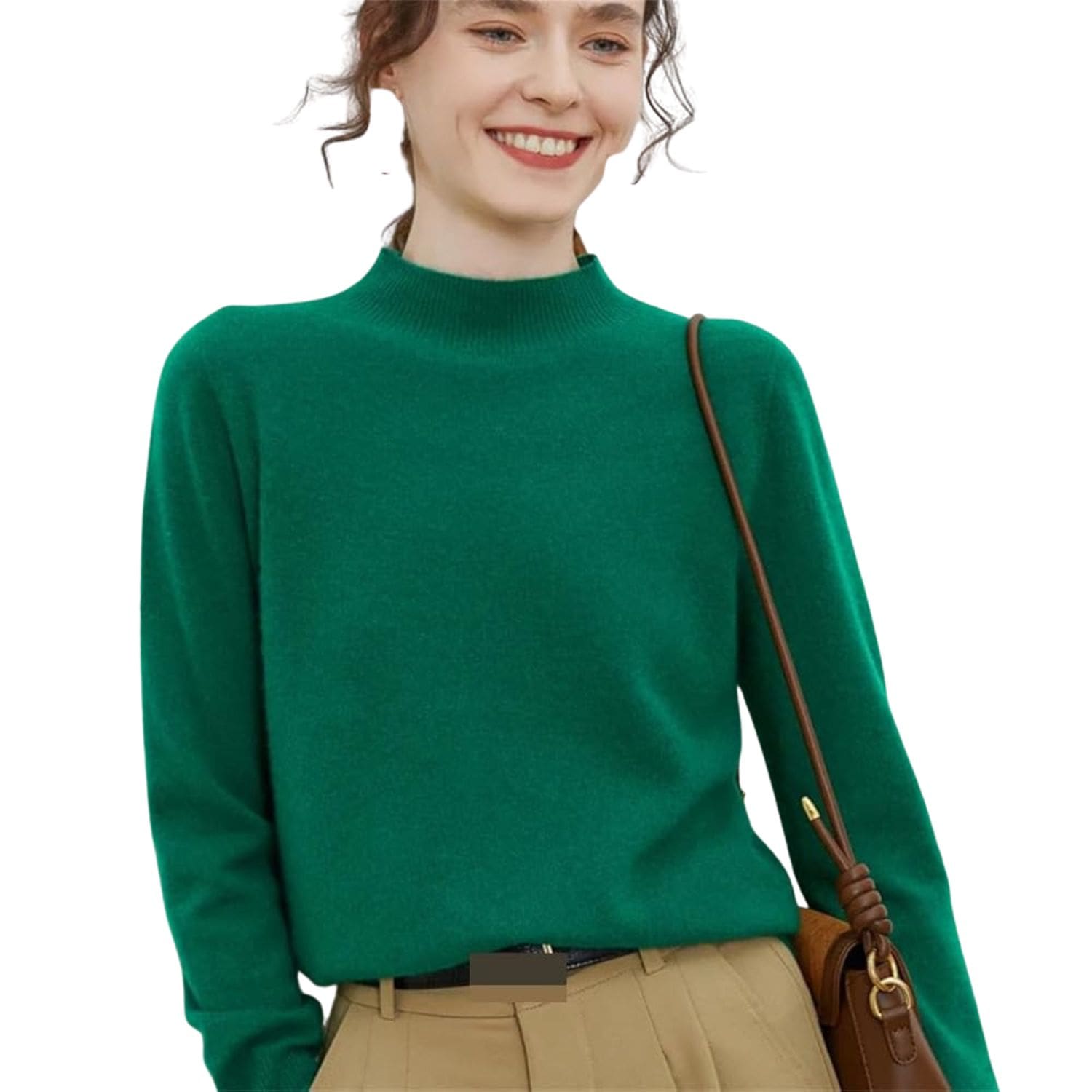 Woman wearing an emerald green mock-neck long-sleeve knit sweater paired with beige trousers and a brown shoulder bag