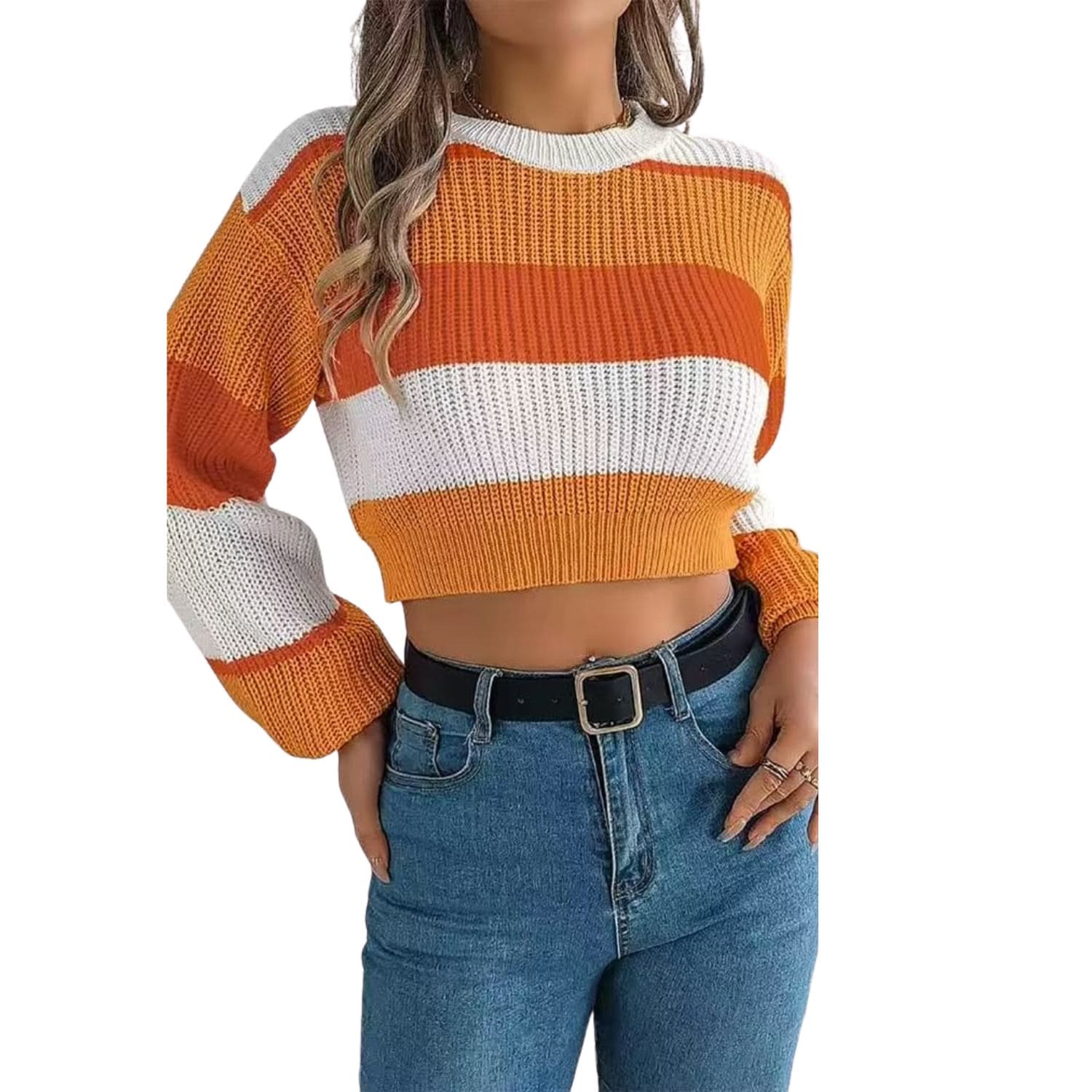 Woman wearing an orange and white striped cropped knit sweater with long sleeves