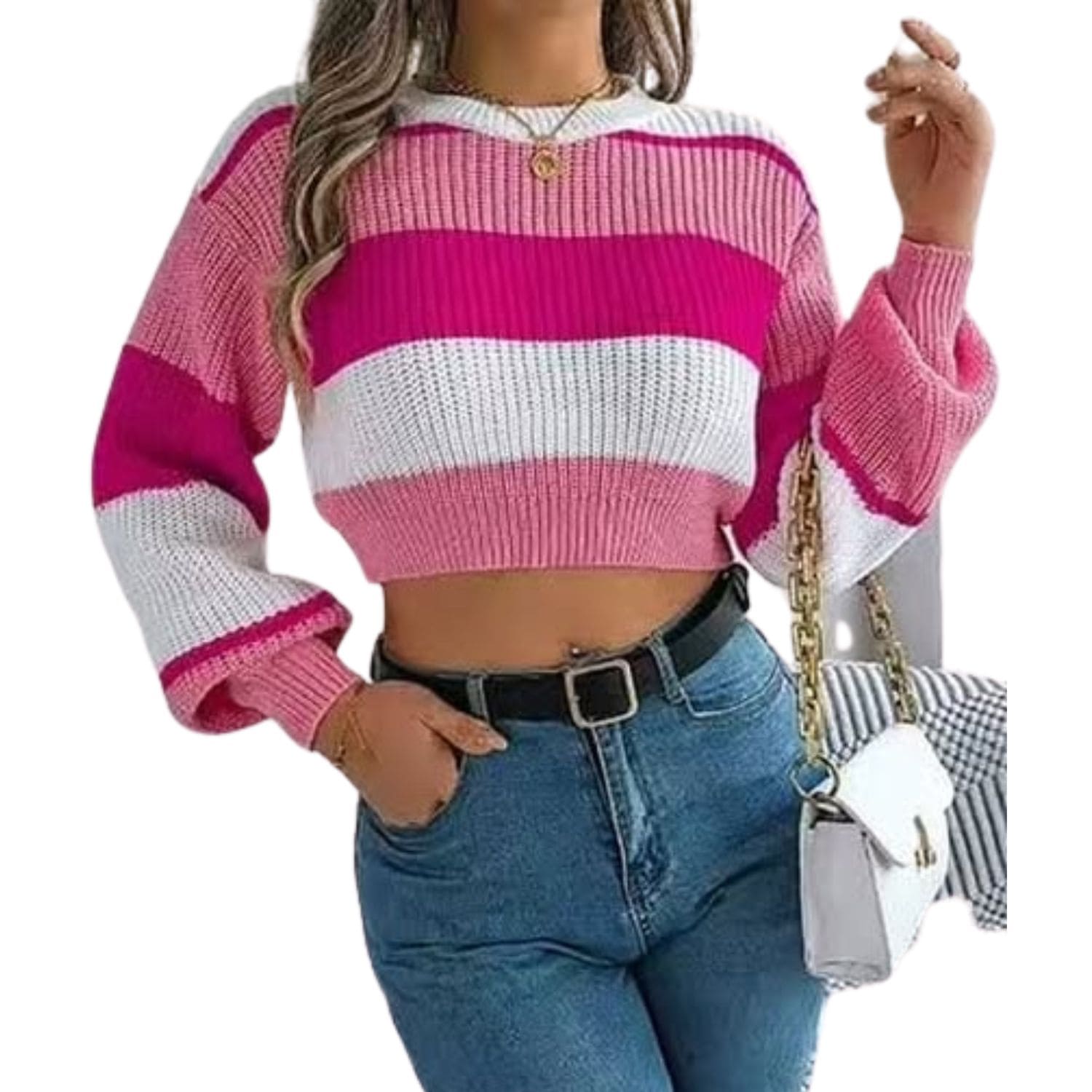 Woman wearing a pink and white striped cropped knit sweater with long sleeves and high-waisted jeans