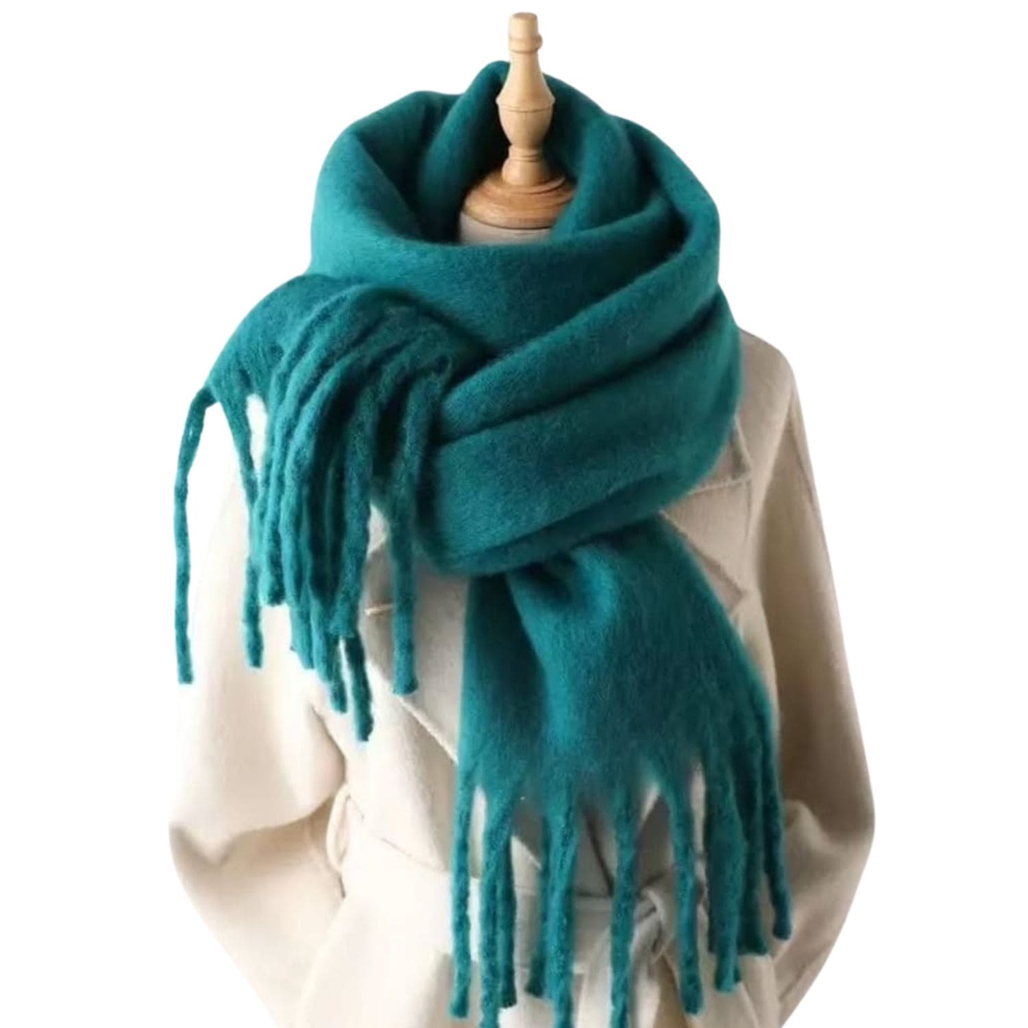 Teal oversized winter scarf with fringes on a mannequin, soft thick cozy wrap for women.