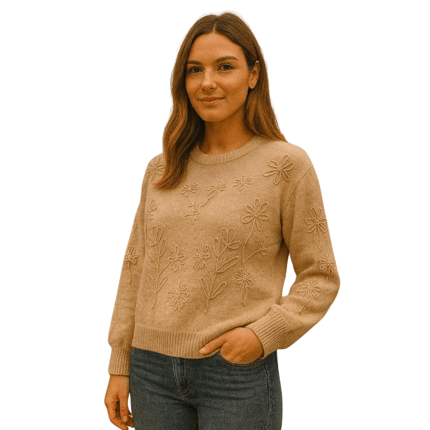 Woman wearing a camel knit sweater with raised floral embroidery detail, paired with blue jeans